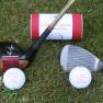 Set of two balls with golf clubs and tube